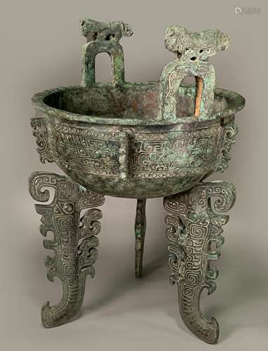 An Inscribed Bronze Tripod Food Vessel