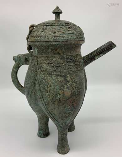 An Inscribed Bronze Ritual Ewer