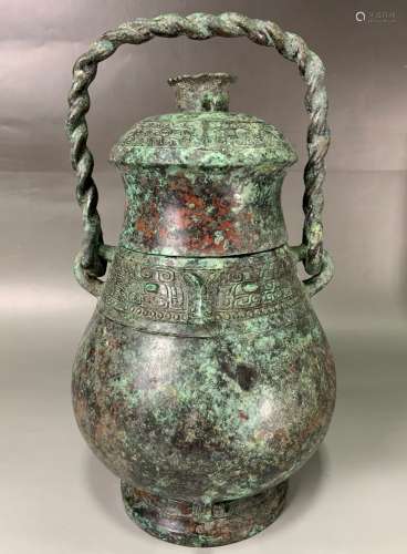 Bronze Covered Wine Vessel