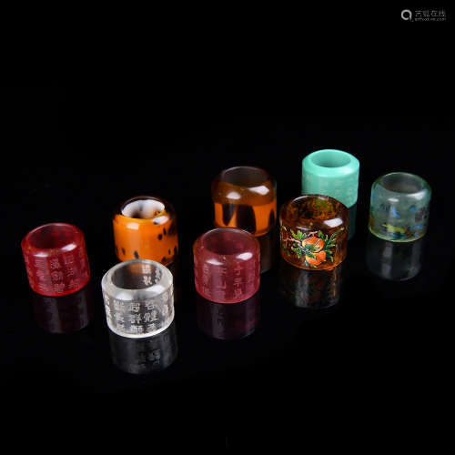 Set Of Eight Glass Archers Rings