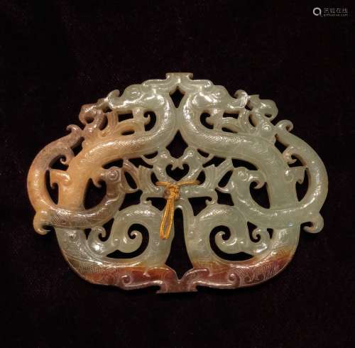 A Carved White Jade Pendant