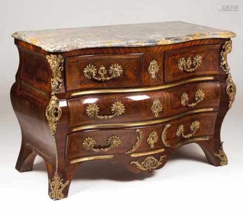 A pair of Louis XV style chests of drawers