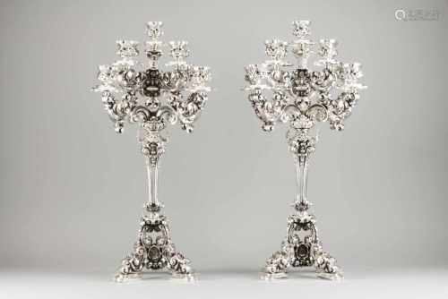 A pair of nine branch candelabra