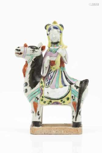 A horse riding figure