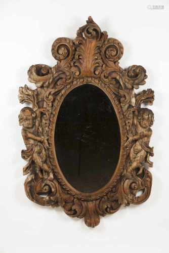 Wooden mirror with cherubs