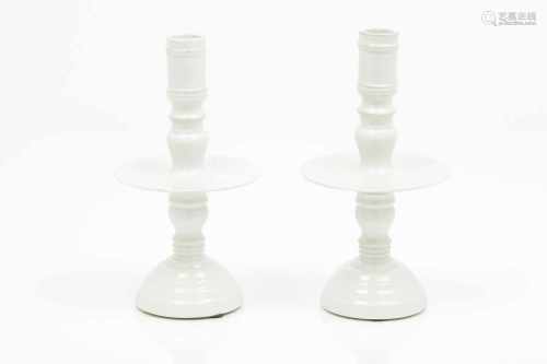 A pair of candle stands