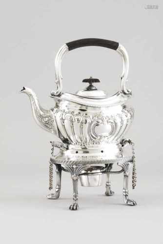 A teapot on stand with burner