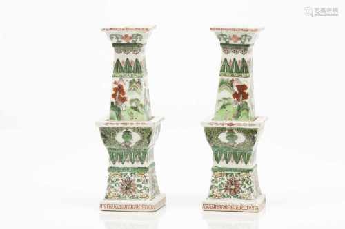 A pair of incense burners/candle stands
