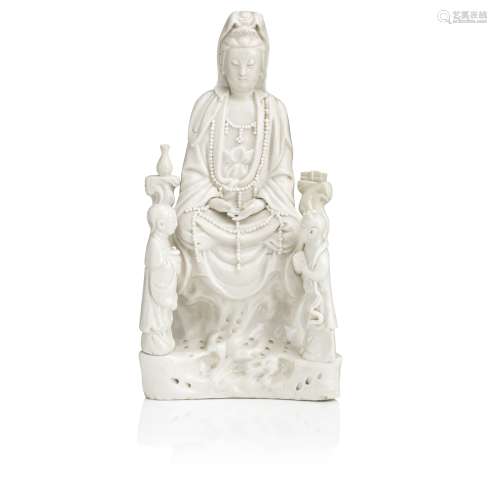 A blanc-de-chine figure of Guanyin and attendants 17th/18th century