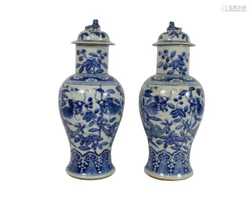 A pair of blue and white vases and covers Late 19th century (4)