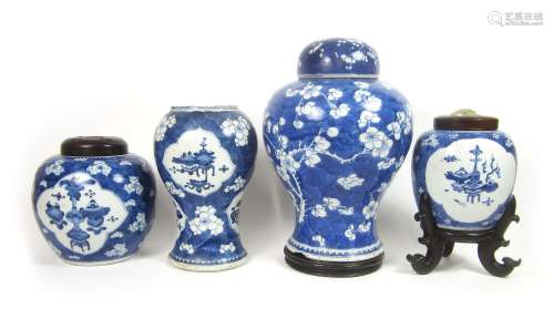 A collection of blue and white 'prunus' jars and covers Kangxi (9)