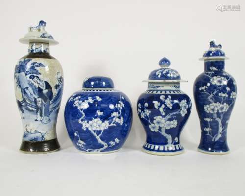 Three blue and white prunus-decorated vases with covers and a crackle ware example Circa 1900 (8)