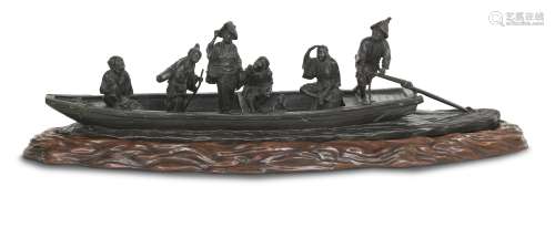 A large and impressive bronze group of figures on a ferry on matching wood stand Meiji Era, unsigned