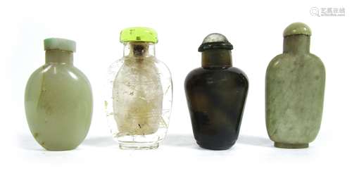 A jade snuff bottle and three other mineral bottles, all with stoppers (8)