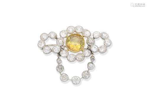 A sphene and diamond brooch