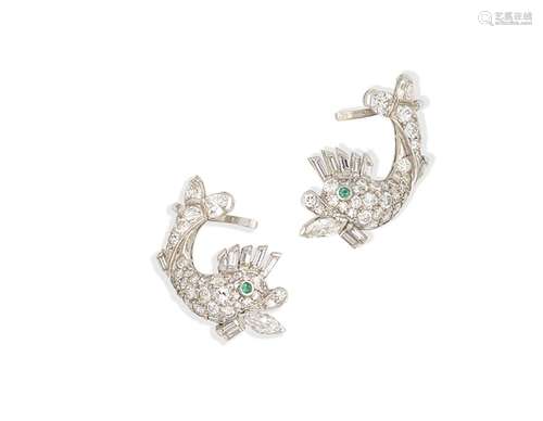 A pair of diamond and emerald dolphin earrings