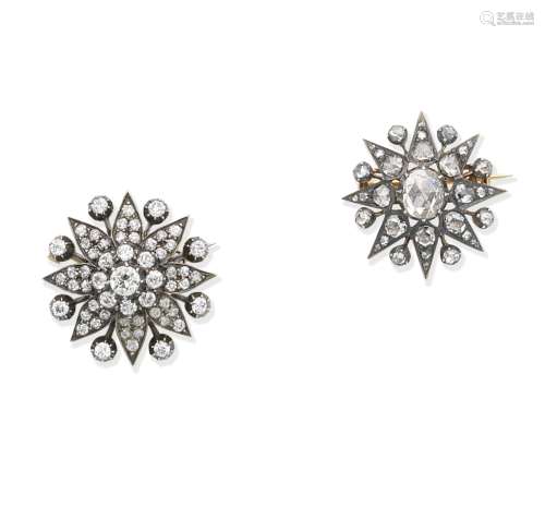 Two diamond star brooches (2)