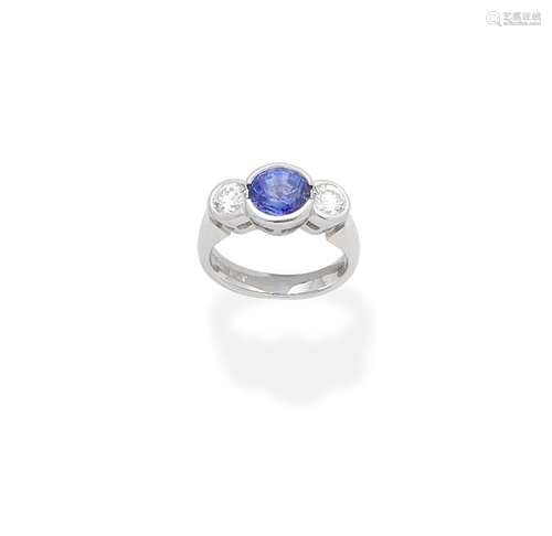 A sapphire and diamond three-stone ring