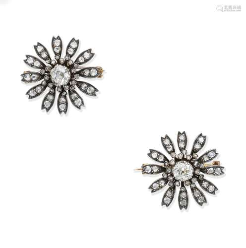 A pair of late 19th century diamond flower brooches (2)