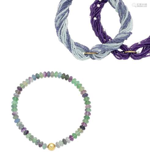 An amethyst and cultured pearl necklace, an aquamarine and iolite necklace and a fluorite necklac...