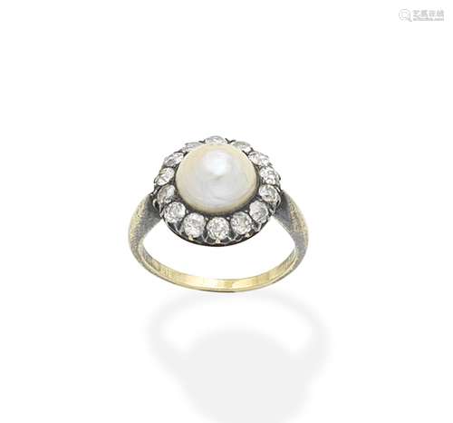 A natural half pearl and diamond cluster ring