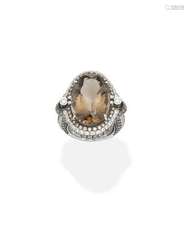 A smokey quartz, coloured diamond and diamond dress ring