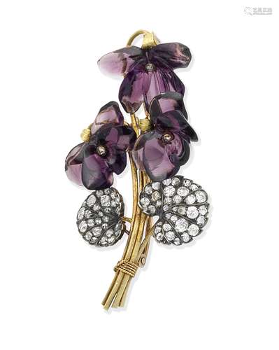 A purple glass/amethyst and diamond flower brooch circa 1900