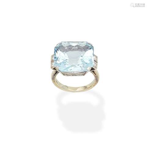 An aquamarine and diamond ring