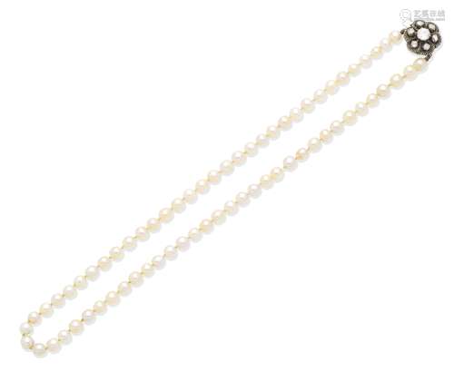 A natural pearl necklace with a diamond clasp