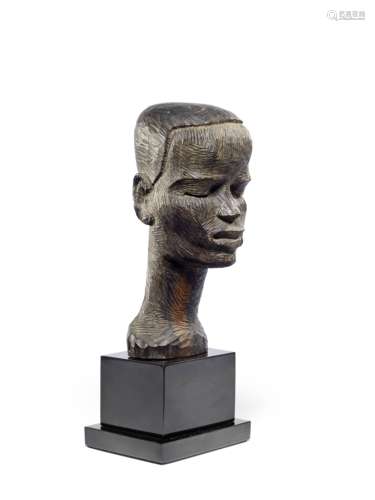 Benedict Chukwukadibia Enwonwu M.B.E (Nigerian, 1917-1994) Portrait of a young man 27 x 10 x 14cm...