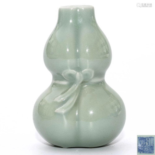 A Celadon Glazed Gourd Shaped Vase, Qianlong…