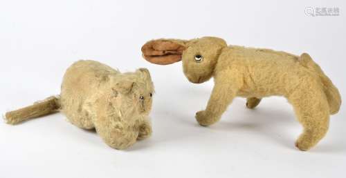 Two early 20th Century toys, a German rabbit with googly eyes, height 34cm and a British pussy cat