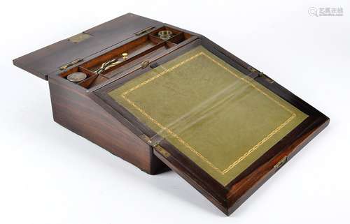 A Victorian rosewood writing slope, with mother of pearl inlays, fitted interior containing two