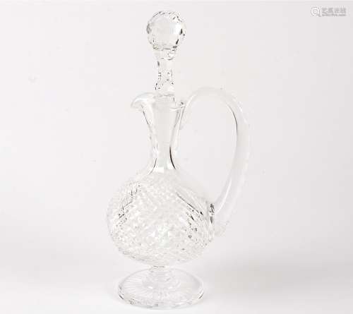 A Waterford crystal cut glass ewer and multi-faceted stopper, a/f with crack, height 33cm