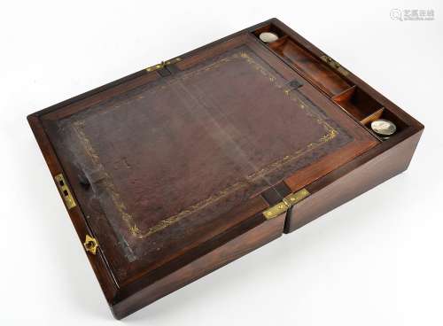 A Victorian rosewood writing slope, with mother of pearl inlays, fitted interior containing two