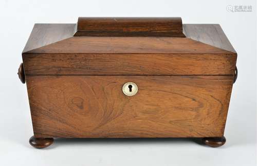 A Victorian rosewood tea caddy, sarcophagus shaped, the hinged lid opening to reveal two lidded