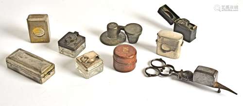 A selection of travelling ink bottles, glass, silver plated and gilt examples including one De La