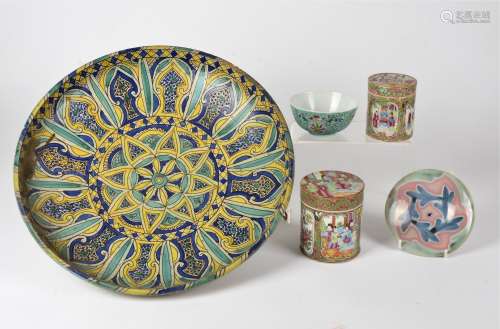 Two Chinese famille rose canisters and covers, a contemporary Chinese rice bowl, an Iznik pottery