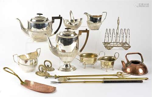 A collection of 20th Century silver plate, including four teapots and coffee pots, a toast rack,