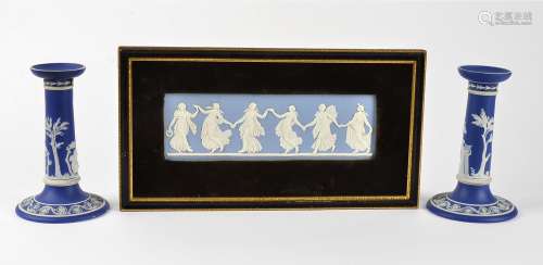 A framed Wedgwood blue and white jasperware plaque 'the dancing hours', with a dancing procession,