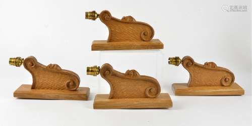 Four Robert Thompson of Kilburn 'Mouseman' oak wall light brackets, rectangular mounting plate
