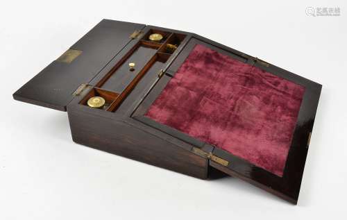 A Victorian rosewood writing slope, with mother of pearl inlay, a fitted interior containing two