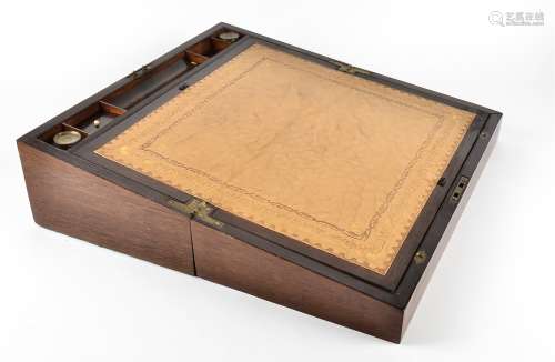 A Victorian rosewood writing slope, inlaid with mahogany panels, a fitted interior containing two