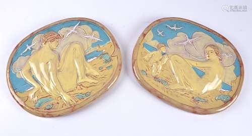 A pair of California Faience (American 1915–1959) terracotta wall plaques, of oblong shape, both