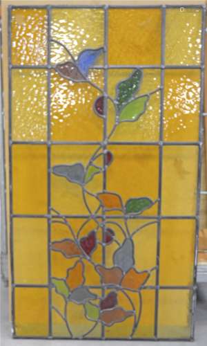 A 1920s stained glass panel, with a still life design, 105cm x 59cm
