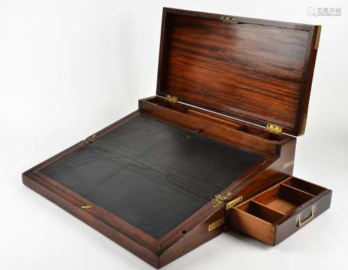 A 20th Century mahogany writing slope with brass mountings, a fitted interior containing two