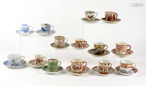 Twenty pairs of 20th Century cups and saucers, predominantly from China and Japan, decorated with