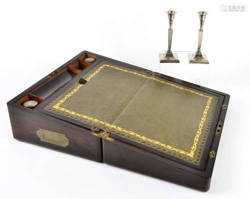 A Victorian rosewood writing slope, inlaid with brass, a fitted interior containing two lidded glass