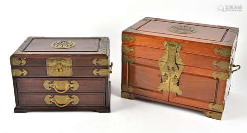 A metal mounted Chinese table top cabinet, with shou symbol, the two doors opening to reveal three