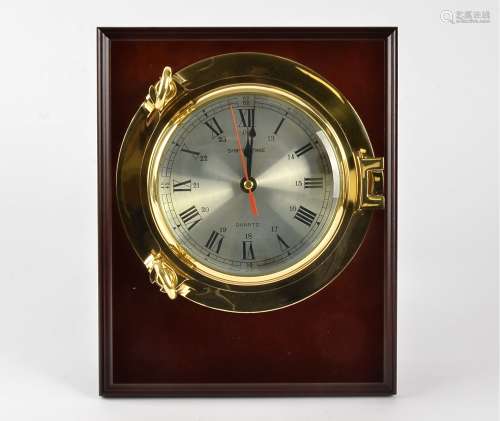 A Quartz ship head style clock, appears new in box, entitled 'ship time' 31cm x 25cm,